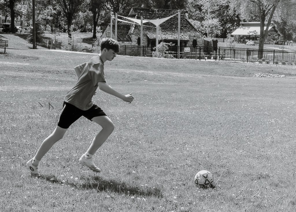 Alpha Academy player training on the pitch